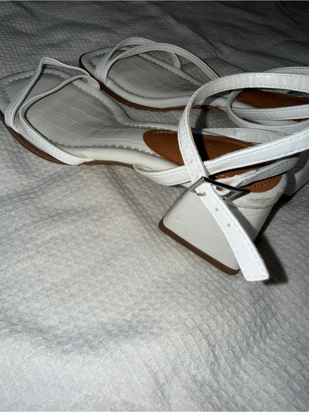 White strappy sandals